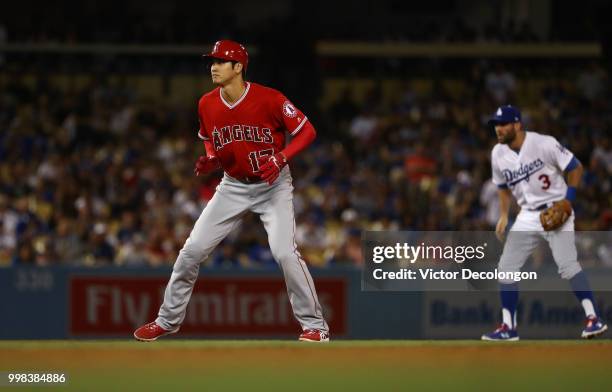 Shohei Ohtani of the Los Angeles Angels of Anaheim leads off from second base during the ninth inning of the MLB game against the Los Angeles Dodgers...