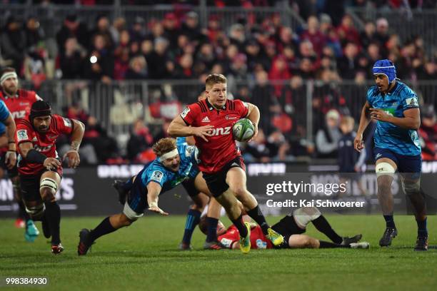 Jack Goodhue of the Crusaders charges forward during the round 19 Super Rugby match between the Crusaders and the Blues at AMI Stadium on July 14,...