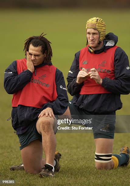 Australian Rugby Union player George Smith and Justin Harrison during training today, at the Cardiff University Sports Grounds, Cardiff, Wales....