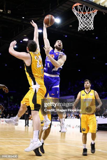 Jordan Ngatai of the Saints goes up for a dunk during the NZNBL match between Wellington Saints and Taranaki Mountainairs at TSB Arena on July 14,...