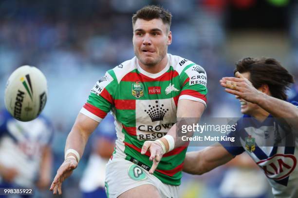 Angus Crichton of the Rabbitohs passes during the round 18 NRL match between the Canterbury Bulldogs and the South Sydney Rabbitohs at ANZ Stadium on...