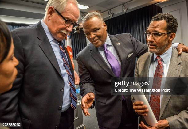 County Executive Rushern Baker III, center right, with Angela Alsobrooks, States Attorney for the county, far left, Kevin Maxwell, CEO for PG County...