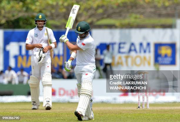 South Africa's Dean Elgar reacts after being dismissed during the third day of the opening Test match between Sri Lanka and South Africa at the Galle...