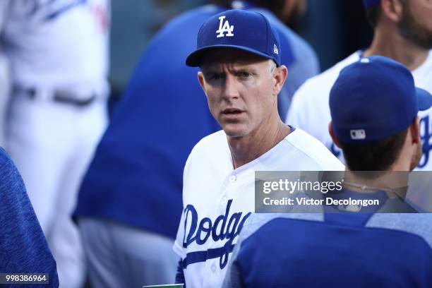 Chase Utley of the Los Angeles Dodgers looks on from the dugout just prior to the start of the MLB game against the Los Angeles Angels of Anaheim at...