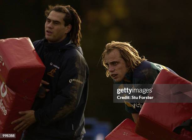 Australian Rugby Union player Phil Waugh with George Smith during training today, at the Cardiff University Sports Grounds, Cardiff, Wales. +Digital...