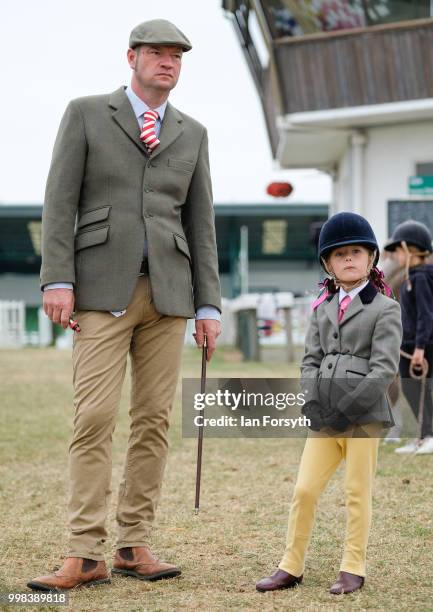 Paul Burdess and his jockey Eva Dent from Seaham wait to compete during the final day of the 160th Great Yorkshire Show on July 12, 2018 in...