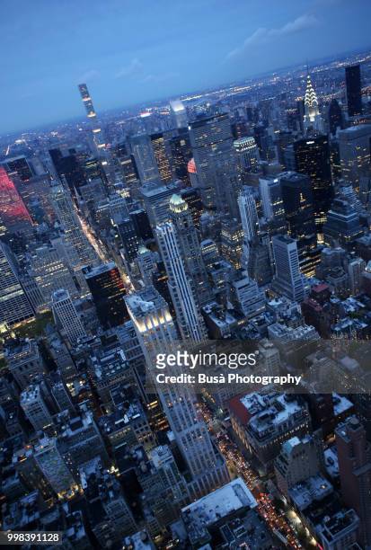 spectacular panoramic view from atop the empire state building at twilight: 432 park avenue and the chrysler building. new york city, usa - park avenue ストックフォトと画像