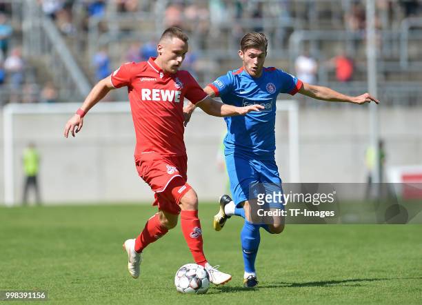 Christian Clemens of Koeln controls the ball during the friendly match between Wuppertaler SV and 1. FC Koeln on July 8, 2018 in Wuppertal, Germany.