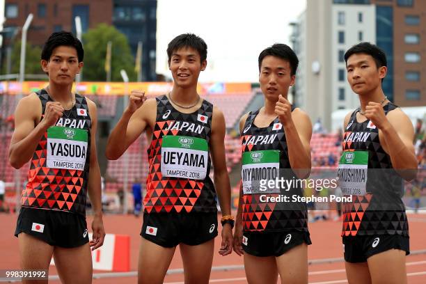 Keigo Yasuda, Koki Ueyama, Daisuke Miyamoto and Satoru Fukushima of Japan pose for a picture ahead of heat 3 of the men's 4x100m relay on day four of...