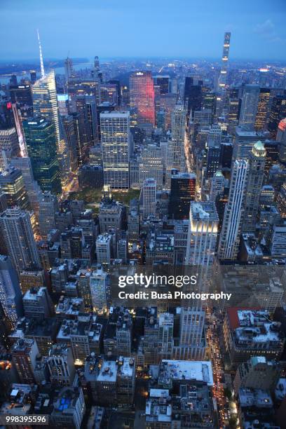 spectacular panoramic view from atop the empire state building at twilight: times square, general electric building, rockefeller center, 432 park avenue. new york city, usa - park avenue ストックフォトと画像
