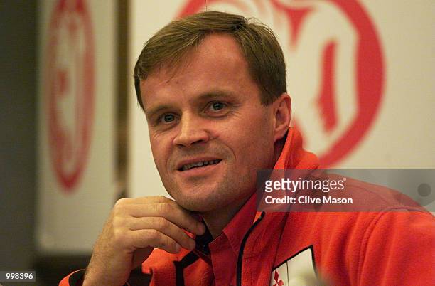 World Rally Championship contender Tommi Makinen of Finland and Mitsubishi talks to the media during the pre-rally press conference for the Network Q...