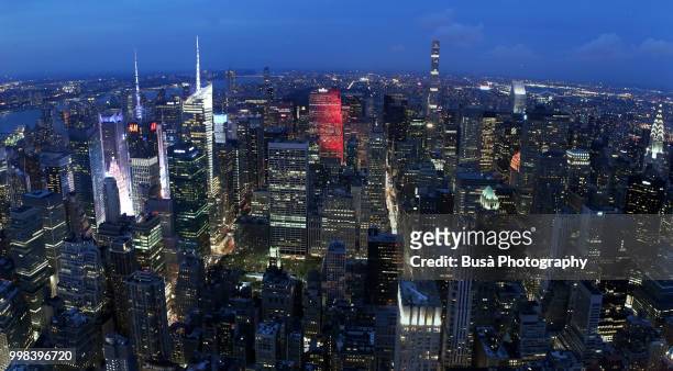 spectacular panoramic view from atop the empire state building at twilight: times square, general electric building, rockefeller center, 432 park avenue, metlife building, chrysler building. new york city, usa - 432 park avenue stock pictures, royalty-free photos & images