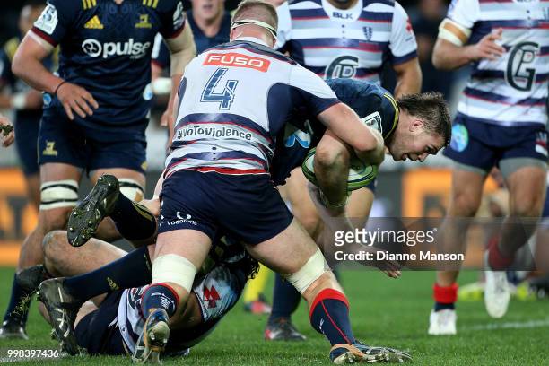 Liam Squire of the Highlanders charges forward during the round 19 Super Rugby match between the Highlanders and the Rebels at Forsyth Barr Stadium...