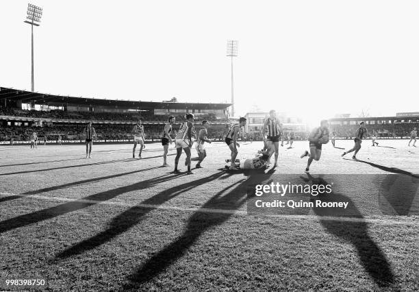 Jarman Impey of the Hawks gathers the ball during the round 17 AFL match between the Hawthorn Hawks and the Brisbane Lions at University of Tasmania...