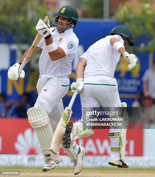 South Africa's Dean Elgar and Aiden Markram run between the wickets during the third day of the opening Test match between Sri Lanka and South Africa...