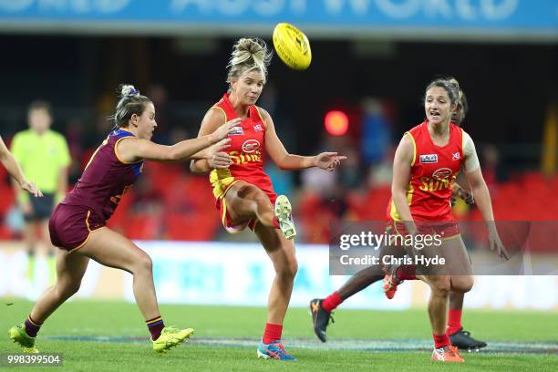 Paige Parker of the Suns kicks during the AFLW Winter Series match between the Gold Coast Suns and the Brisbane Lions at Metricon Stadium on July 14,...