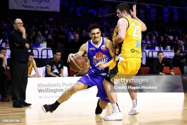 Thane O'Leary of the Mountainairs defends against Shea Ili of the Saints during the NZNBL match between Wellington Saints and Taranaki Mountainairs...