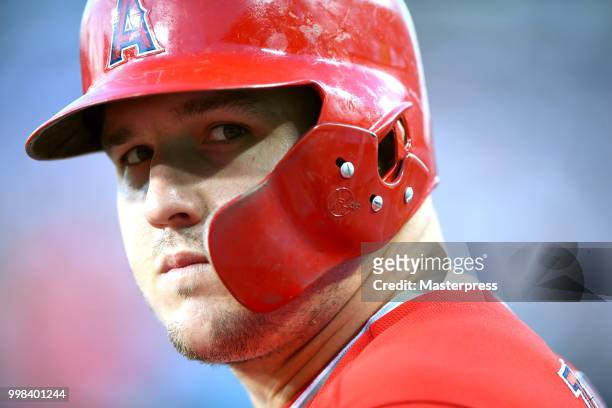 Mike Trout of the Los Angeles Angels of Anaheim looks on during the MLB game against the Los Angeles Dodgers at Dodger Stadium on July 13, 2018 in...