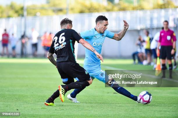 Mathieu Debuchy of Saint Etienne and Lucas Ocampos of Marseille during the Friendly match between Marseille and Saint Etienne on July 13, 2018 in...
