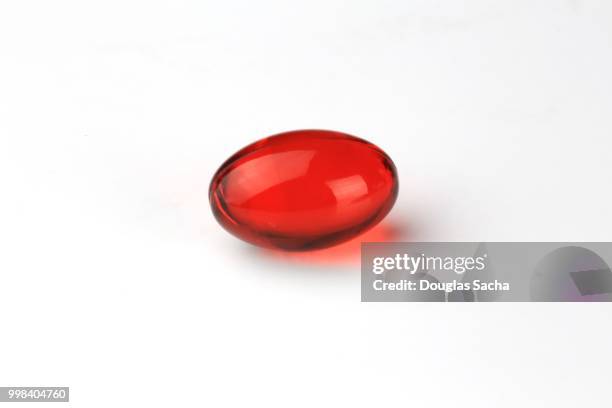 gel type pill with liquid medication - medicare prescription drug plan stock pictures, royalty-free photos & images