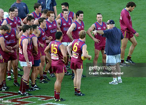 Leigh Matthews of the Brisbane Lions talks to his players during their training session at the Gabba in Brisbane, Australia. The Lions are preparing...