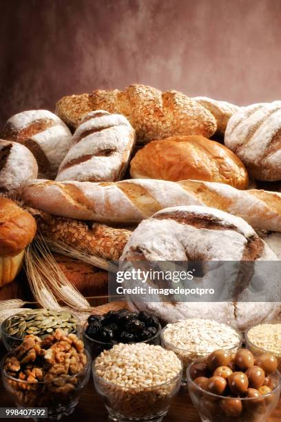 close up assorted fresh breads arrangement - sweetbread stock pictures, royalty-free photos & images