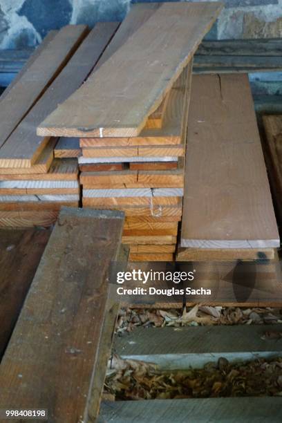 finished lumber stacked for purchase - sawdust isolated stock pictures, royalty-free photos & images
