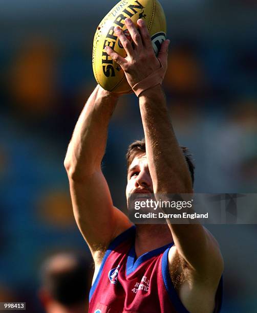 Robert Copeland of the Brisbane Lions takes a mark during the Lions training session at the Gabba in Brisbane, Australia. The Lions are preparing for...