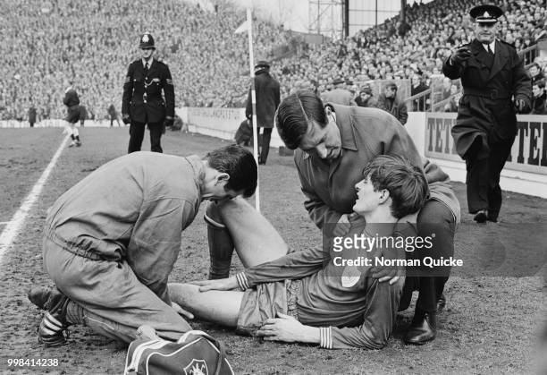 Irish former soccer player and manager of Leicester City FC Frank O'Farrell comforting soccer player Allan Clarke during the FA Cup semi-final...