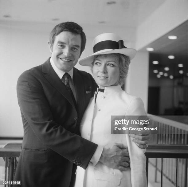 Scottish performer, producer, impresario and director Jimmy Logan with his fiancee, British fashion designer Gina Fratini , pictured together before...