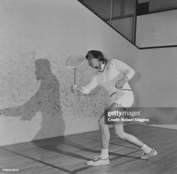 British Formula One racing driver James Hunt pictured playing a game of squash to keep fit on 21st December 1973.