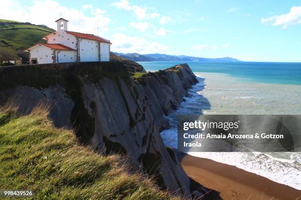 chapel of san telmo and itzurun beach in zumaia, basque country - geologic time scale stock pictures, royalty-free photos & images