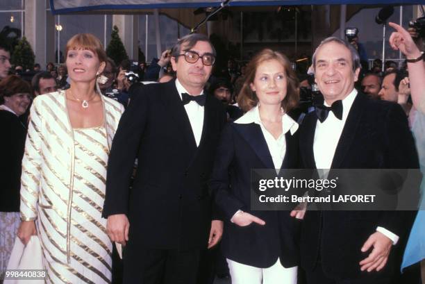 Stéphane Audran, son mari Claude Chabrol, Isabelle Huppert et Jean Carmet au Festival de Cannes le 20 mai 1978, France.