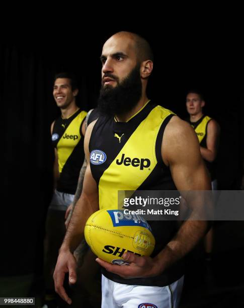 Bachar Houli walks through the race during the round 17 AFL match between the Greater Western Sydney Giants and the Richmond Tigers at Spotless...