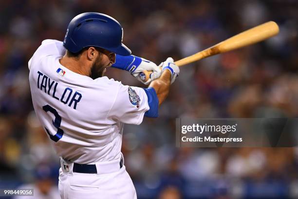 Chris Taylor of the Los Angeles Dodgers at bat during the MLB game against the Los Angeles Angels of Anaheim at Dodger Stadium on July 13, 2018 in...