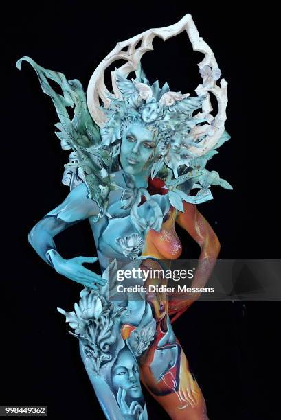 Model, painted by bodypainting artists Gloria Bordin and Giulia Ronzini from Italy, poses for a picture at the 21st World Bodypainting Festival 2018...
