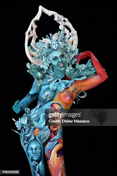 Model, painted by bodypainting artists Gloria Bordin and Giulia Ronzini from Italy, poses for a picture at the 21st World Bodypainting Festival 2018...