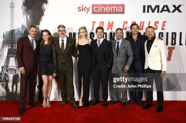 Frederick Schmidt, Rebecca Ferguson, Christopher McQuarrie, Vanessa Kirby, Tom Cruise, Jake Meyers, Henry Cavill and Simon Pegg attend the UK...