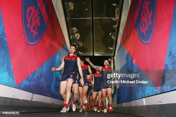 Alex Neal-Bullen and Nathan Jones of the Demons celebrate the win during the round 17 AFL match between the Melbourne Demons and the Western Bulldogs...