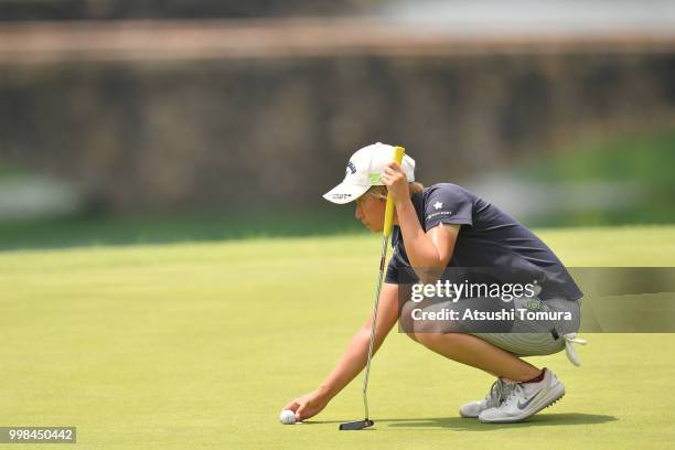 Seira Oki of Japan lines up her putt on the 5th hole during the second round of the Samantha Thavasa Girls Collection Ladies Tournament at the Eagle...