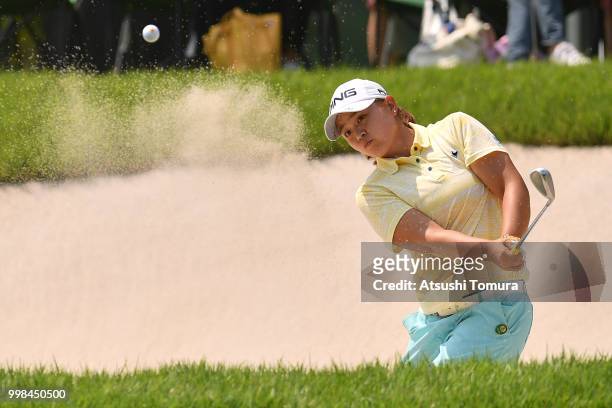Himawari Ogura of Japan hits from a bunker on the 18th hole during the second round of the Samantha Thavasa Girls Collection Ladies Tournament at the...