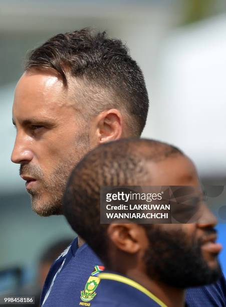 South Africa's captain Faf du Plessis looks on after the Sri Lankan victory in the opening Test match between Sri Lanka and South Africa at the Galle...