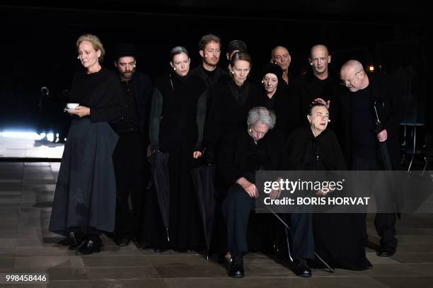 Actors perform in the play " De Dingen Die Voorrbijgaan' " from Louis Couperus directed by Belgian stage director Ivo Van Hove in Avignon on July 13...