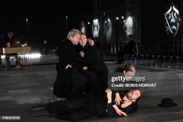 Actors perform in the play " De Dingen Die Voorrbijgaan' " from Louis Couperus directed by Belgian stage director Ivo Van Hove in Avignon on July 13...