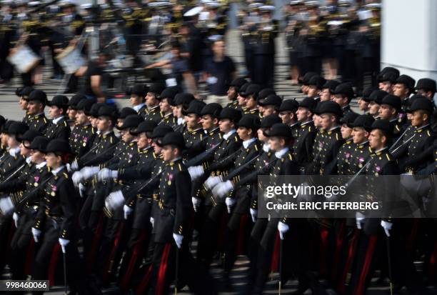 Members of Ecole Polytechnique march during the annual Bastille Day military parade on the Champs-Elysees avenue in Paris on July 14, 2018.