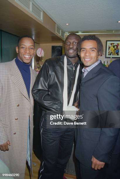 Fotballers Ian Wright and at at Trevor Sinclair the opening of the Football Football sports bar on Haymarket, London, 25th March 1996.