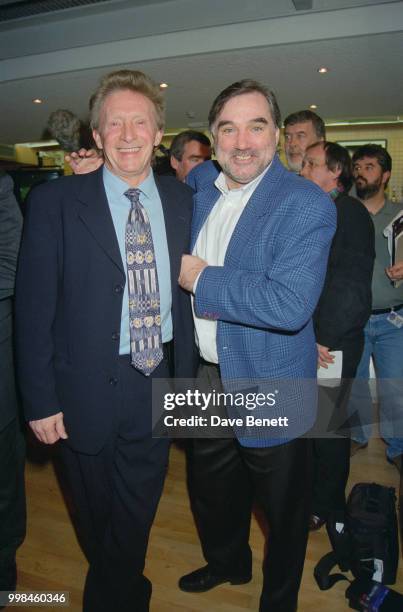 Former footballers Denis Law and George Best at the opening of the Football Football sports bar on Haymarket, London, 25th March 1996.