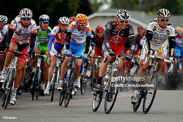 Lance Armstrong of team Radio Shack rides with Bernhard Eisel of Austria riding for team HTC-Columbia during stage two of the Tour of California on...