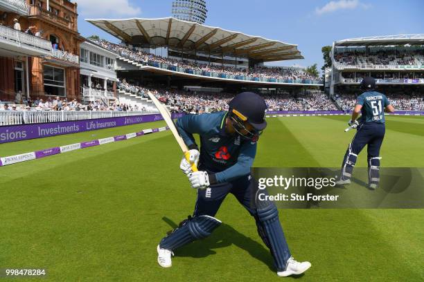 England batsmen Jason Roy and Jonny Bairstow come out to bat during the 2nd ODI Royal London One Day International match between England and India at...