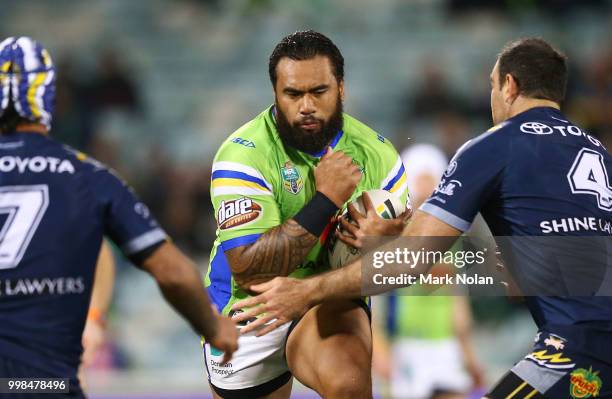 Junior Paulo of the Raiders runs the ball during the round 18 NRL match between the Canberra Raiders and the North Queensland Cowboys at GIO Stadium...